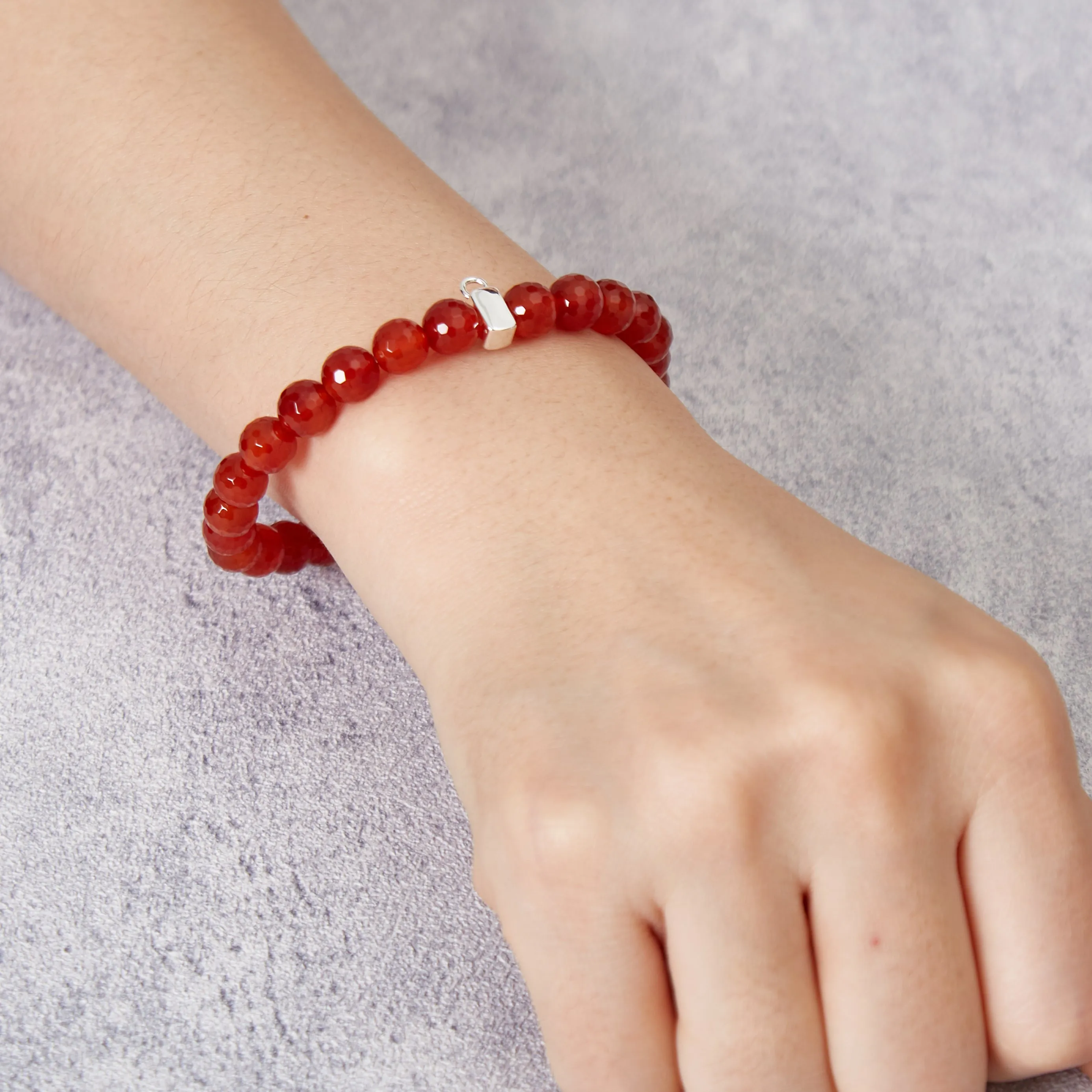 Faceted Carnelian Gemstone Stretch Bracelet with Charm Created with Zircondia® Crystals