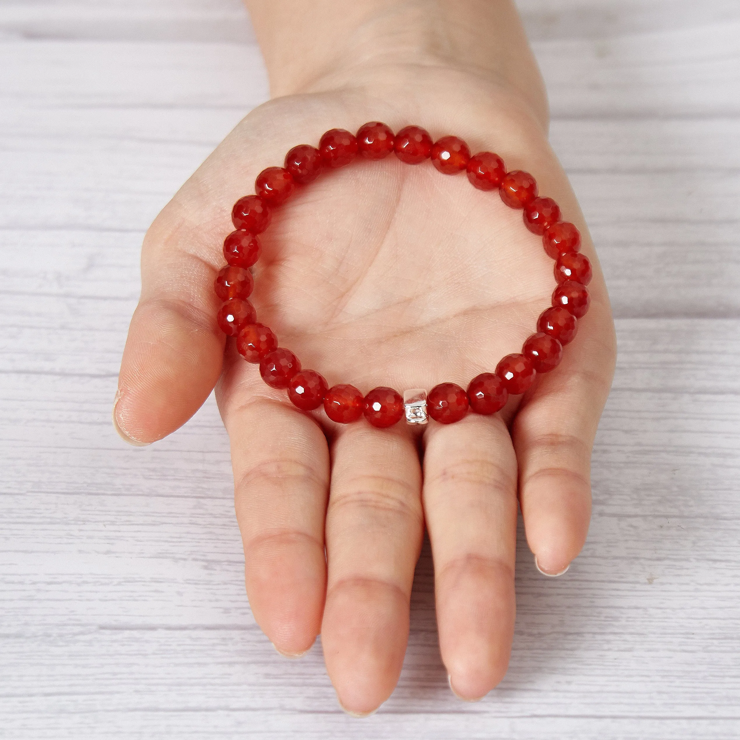 Faceted Carnelian Gemstone Stretch Bracelet with Charm Created with Zircondia® Crystals