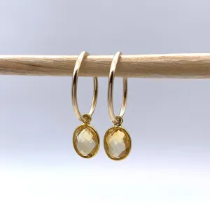Gemstone earrings with citrine (yellow) oval crystal drops on gold small hoops