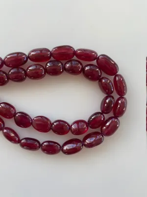 Ruby, Dark Red Color with great transparency, Oval Shape, Plain, Earth Mined, Glass Filled, Oval/Tumble Shaped Plain ruby, 16 inches Strand.
